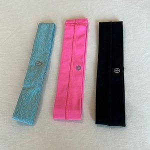 3 Lululemon stretch headbands.